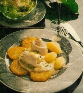 schollenröllchen auf orangen (fisch)
